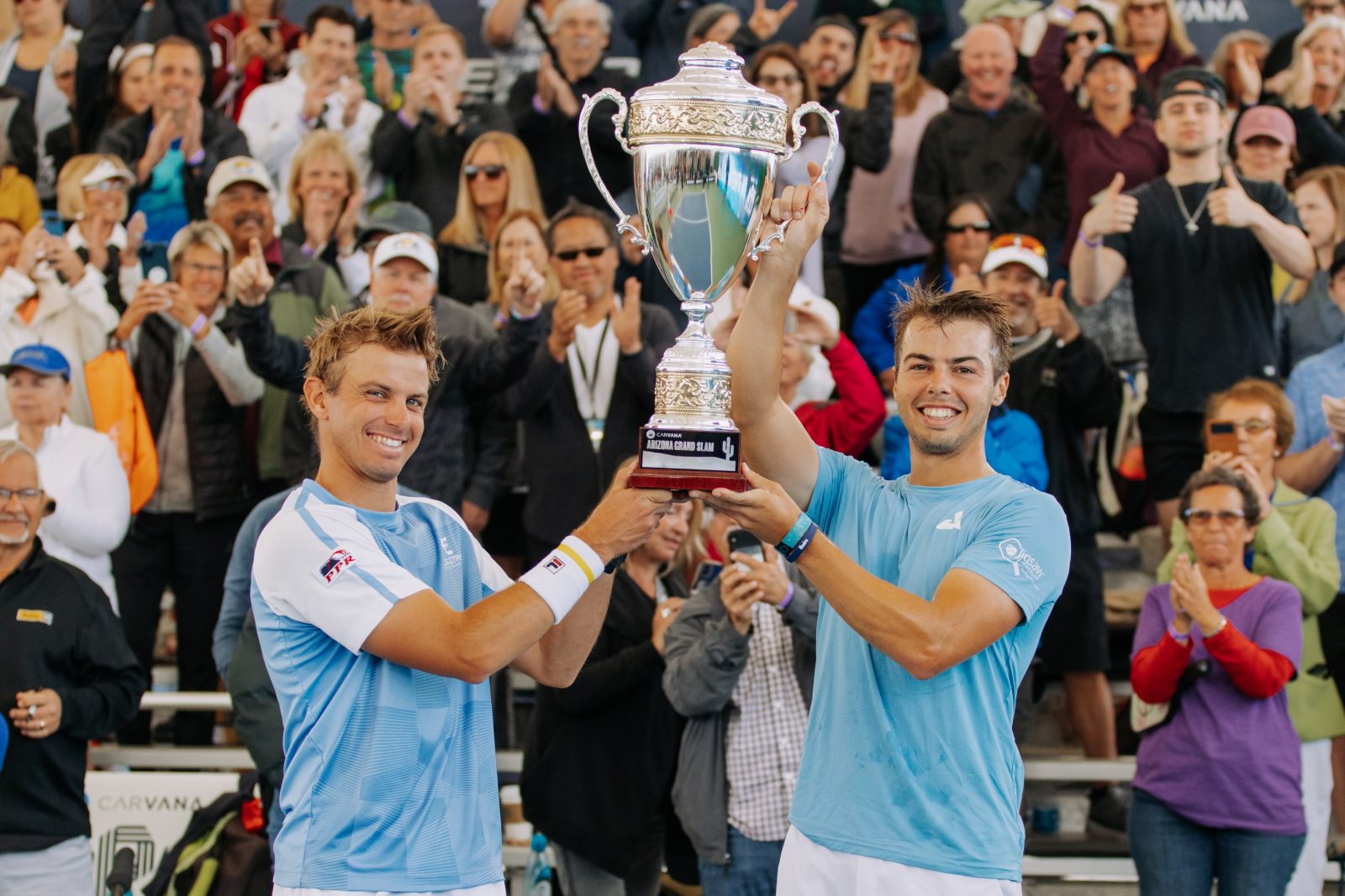 Ben Johns and Collin Johns celebrating a tournament win